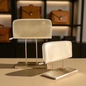 Cartier Happy Birthday Round Zip Long Wallet in gold-colored patent leather